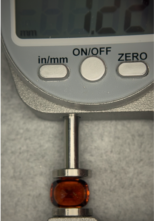 Customer gemstone being measured and documented