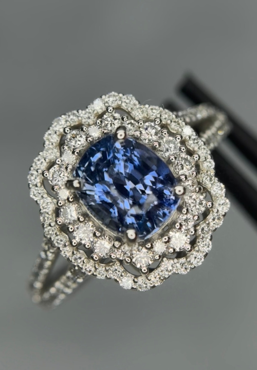 Custom blue sapphire double-halo ring created for a returning Sookjai client